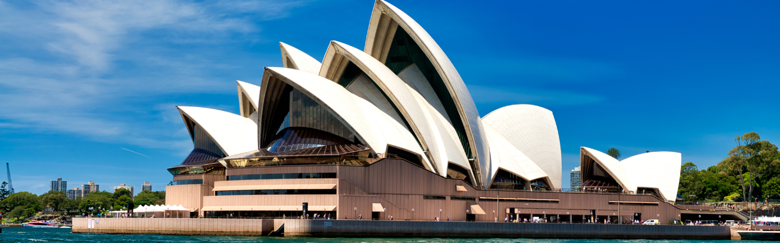 The outside of the Sydney Opera House during the day